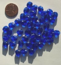 50 8-9mm Dented Twisted Ovals - Sapphire